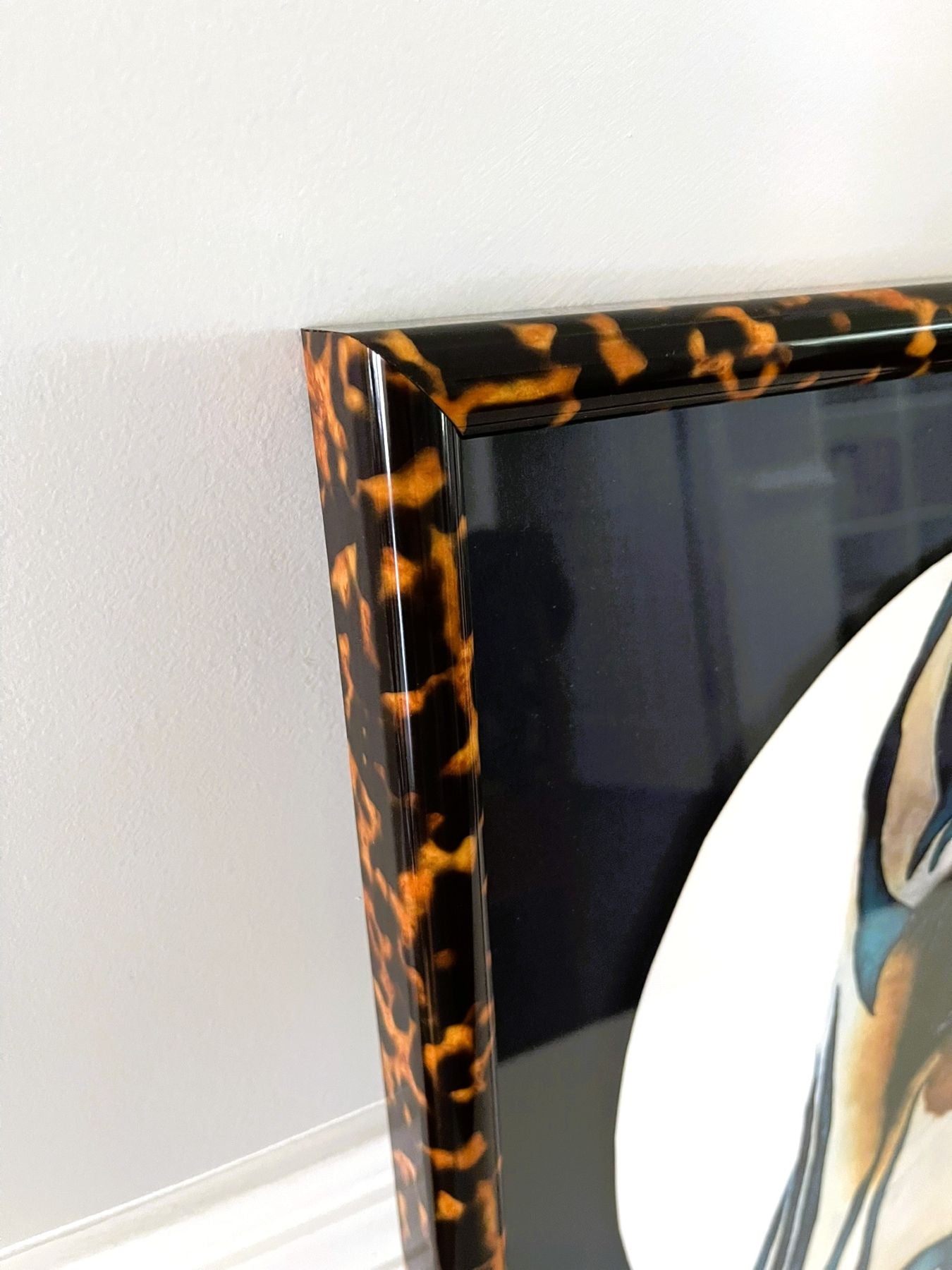 Tortoiseshell-framed art