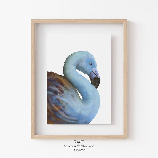 Framed artwork of a blue flamingo on a white wall