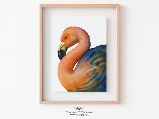 Framed watercolor painting of a flamingo on a white wall